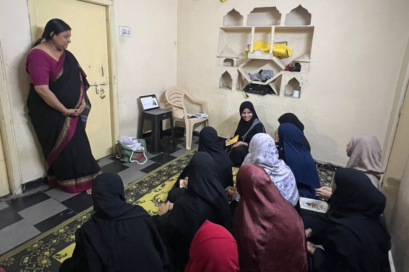 Participants seated on the floor during a small-group session